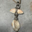 Lou Zeldis-shell and sterling silver pendant with chestnut cord