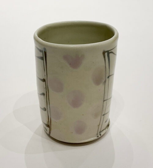 Delores Fortuna tumbler alternating with black and white stripes and pink dots
