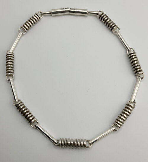 Silver tube and coil necklace