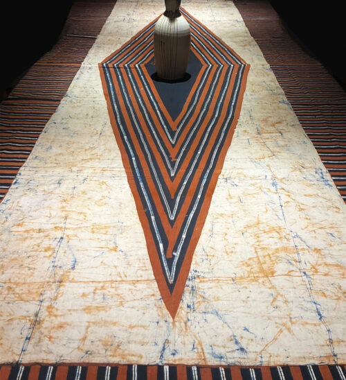 Diamond batik textile by Lou Zeldis, used as tablecloth