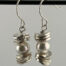 Christine Sundt, Thirds earrings