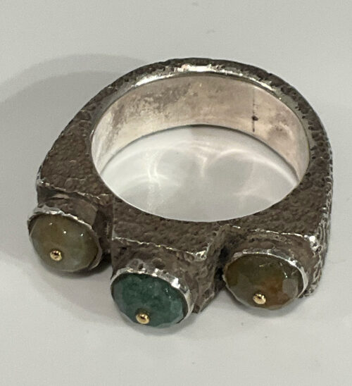 Lou Zeldis, Silver ring with raw emerald and green garnet